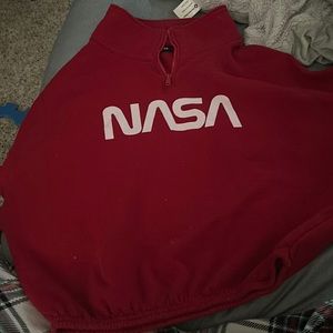 Red NASA Quarter Zip hoodie it’s also cropped.